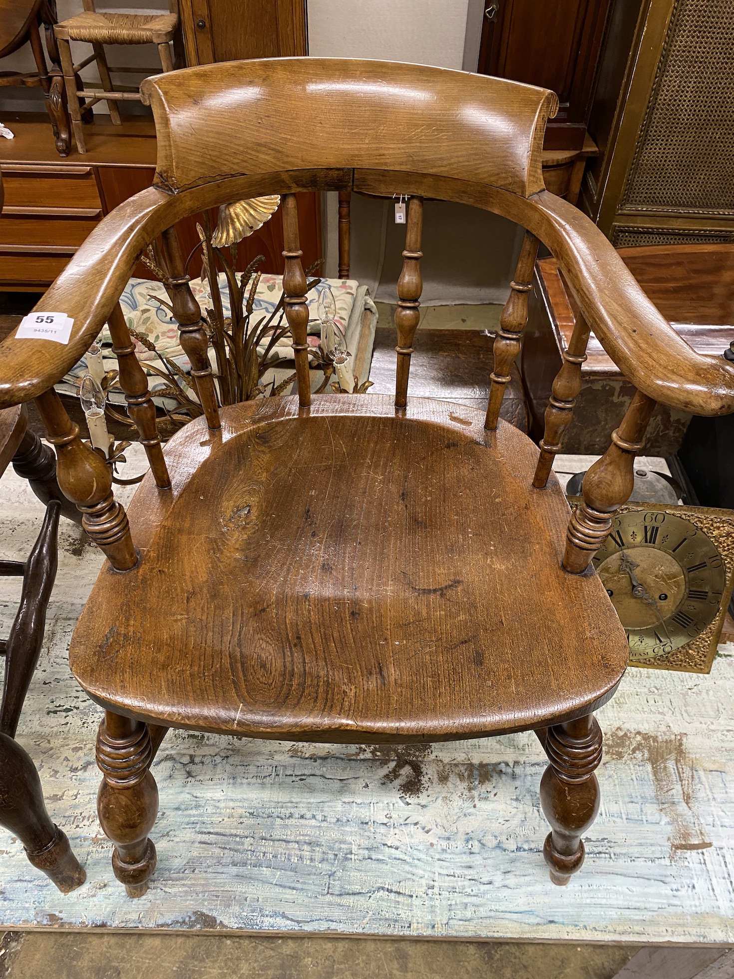 A Victorian elm and beech smoker's bow elbow chair, width 63cm, depth 52cm, height 78cm